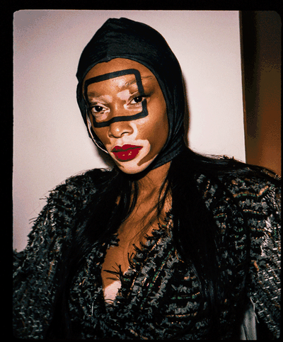 GIFs from Matty Bovan's fanciful first solo show complete with floating headpieces