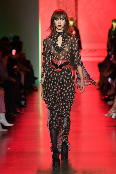 Following campaign glory, Vaughan Ollier flexes other model muscles opening and closing Anna Sui